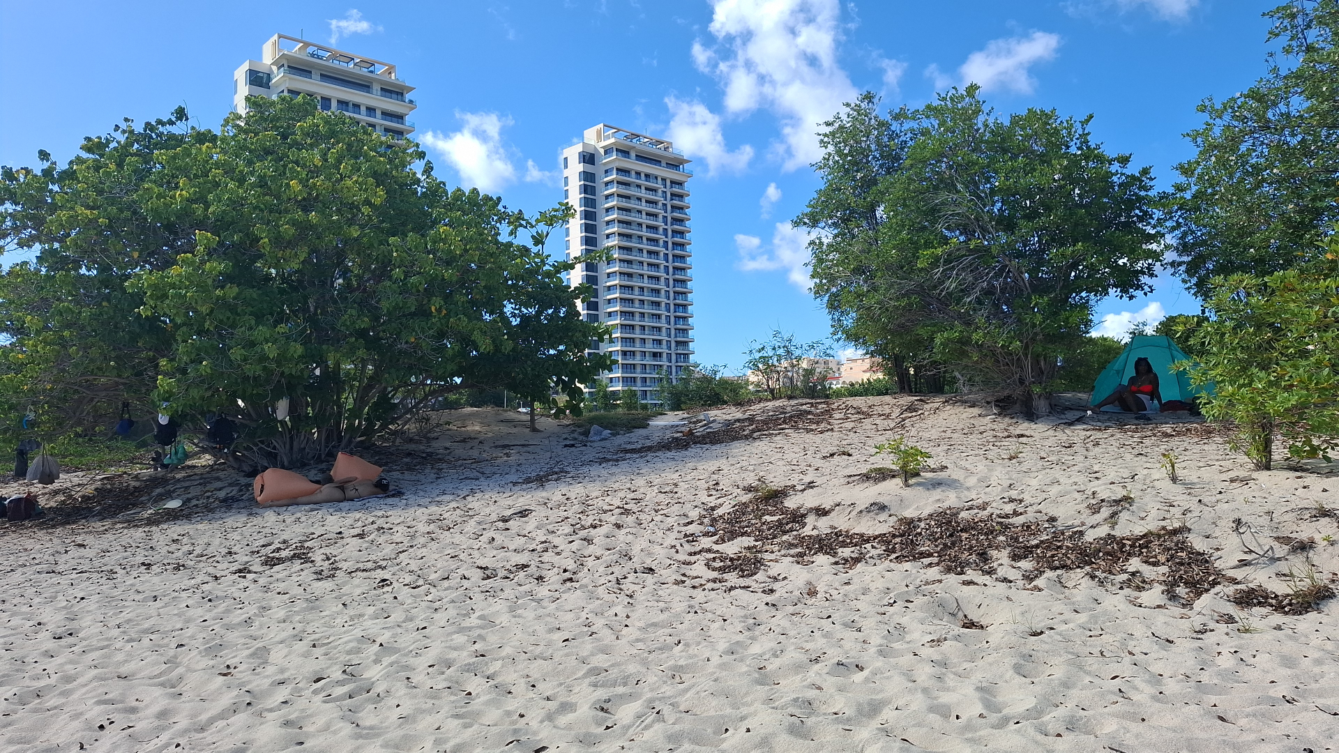 Beach-hopping stop overlooking the blue water at Mullet Bay