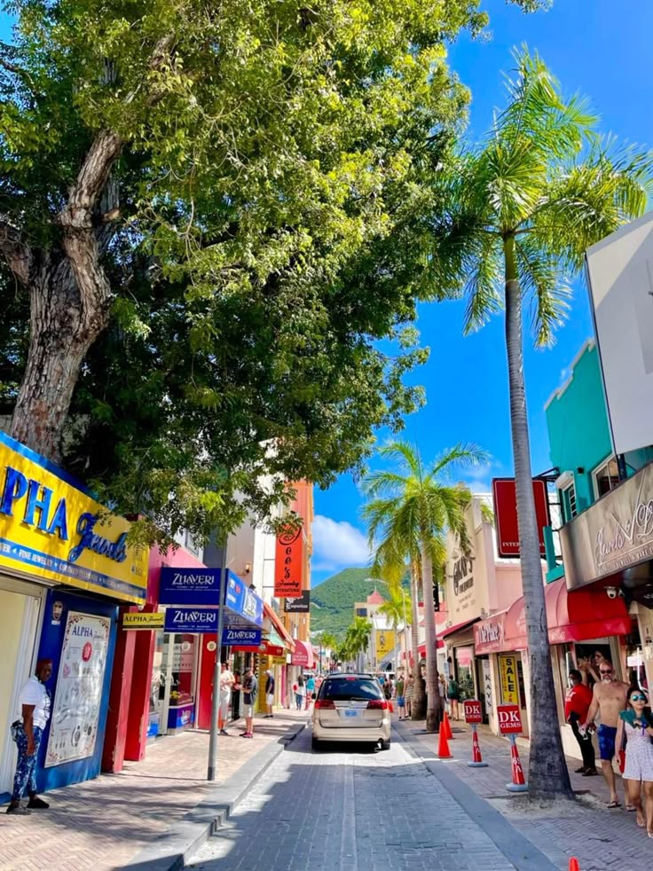 Front Street in Philipsburg lined with shops and palm trees